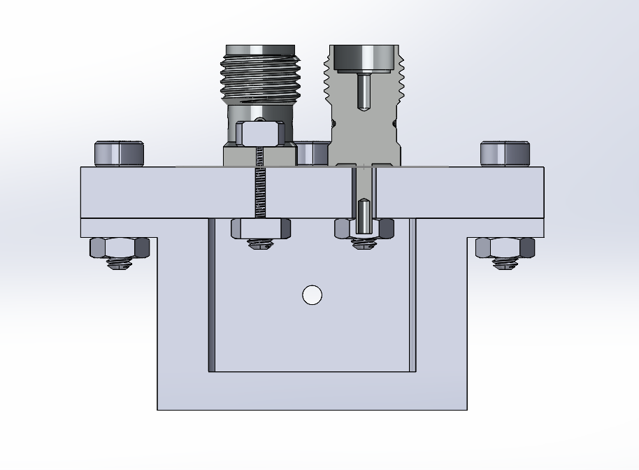 Cross-section CAD drawing showing SMA probes entering the cavity